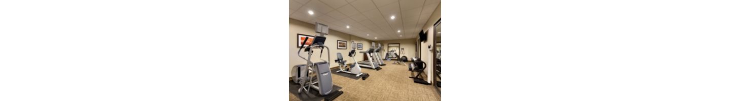 Break a sweat at our 24-hour Fitness Center with treadmills, ellipticals, weight bench, free weights, and exercise bikes. Complimentary towel service, water, and earbuds are offered for your workout.